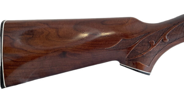 Remington 1100 12ga 2.75" 28" Modified Choke Blued Wood Engraved - Image 2