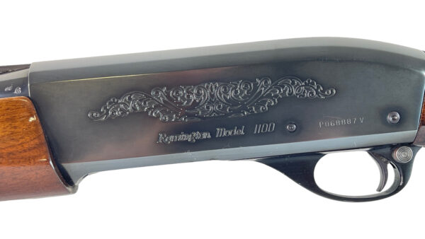 Remington 1100 12ga 2.75" 28" Modified Choke Blued Wood Engraved - Image 10